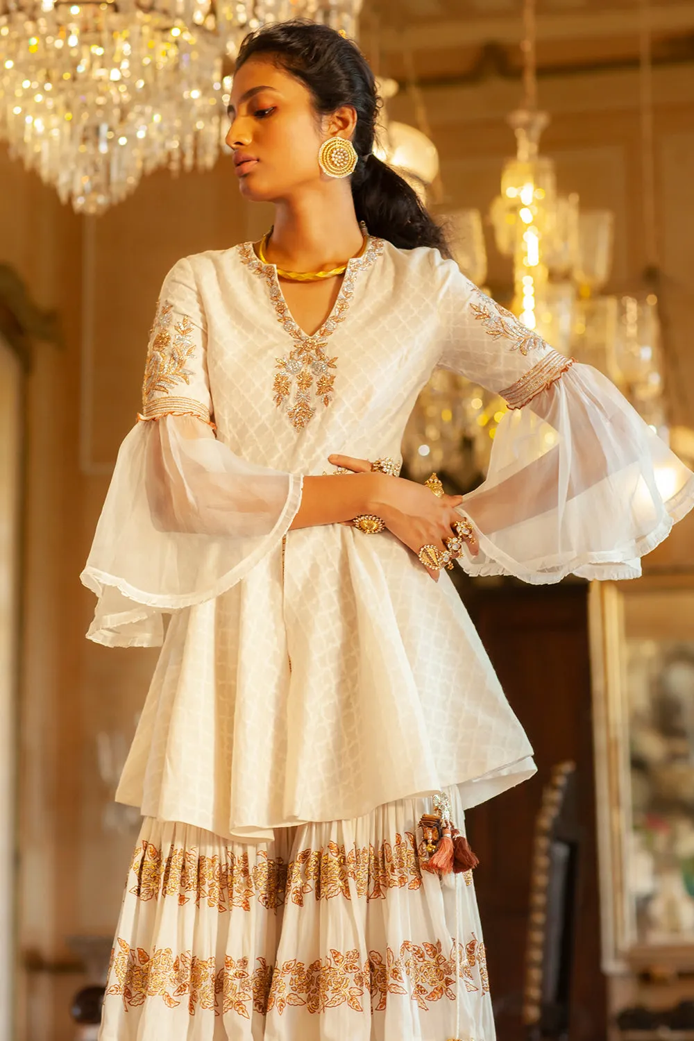Embroidered peplum top sharara set