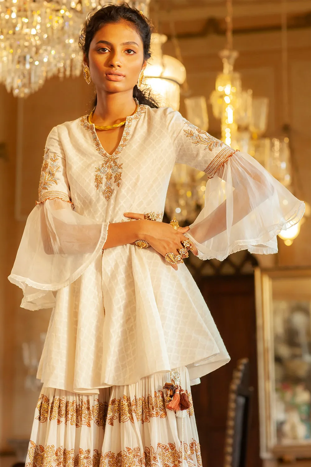 Embroidered peplum top sharara set