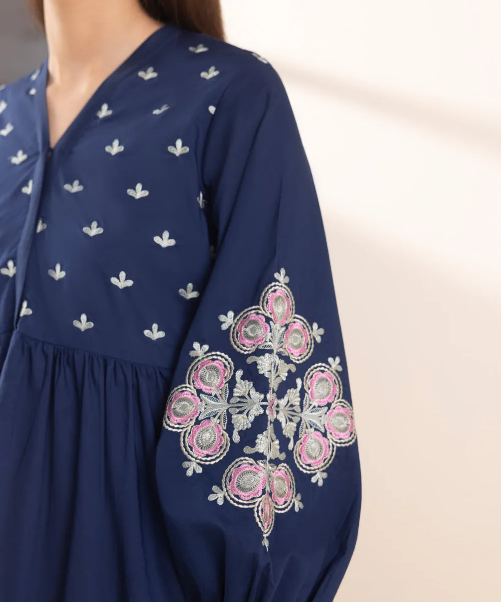 Embroidered Peplum Top
