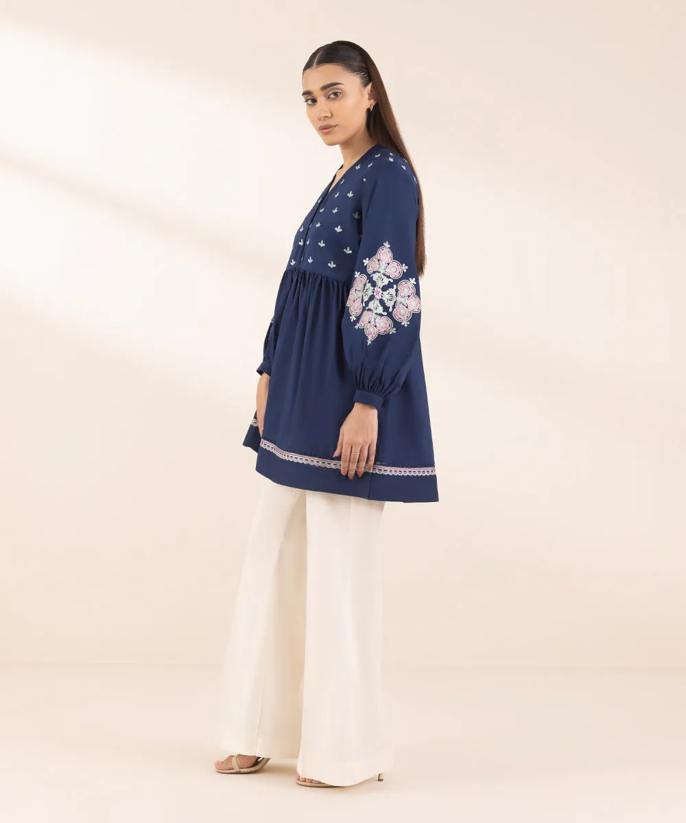 Embroidered Peplum Top