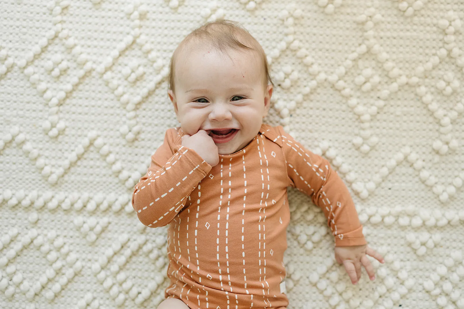 Long Sleeve Bodysuit - Rust Geo