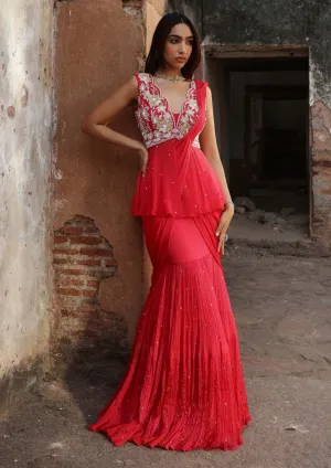 Nikhita coral pink draped sari and peplum