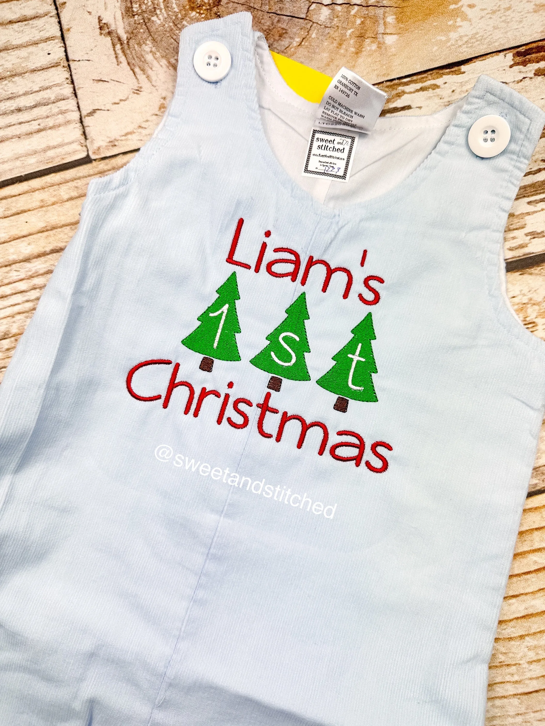 Personalized Baby Boy 1st Christmas outfit - monogrammed Christmas corduroy overalls in light blue.