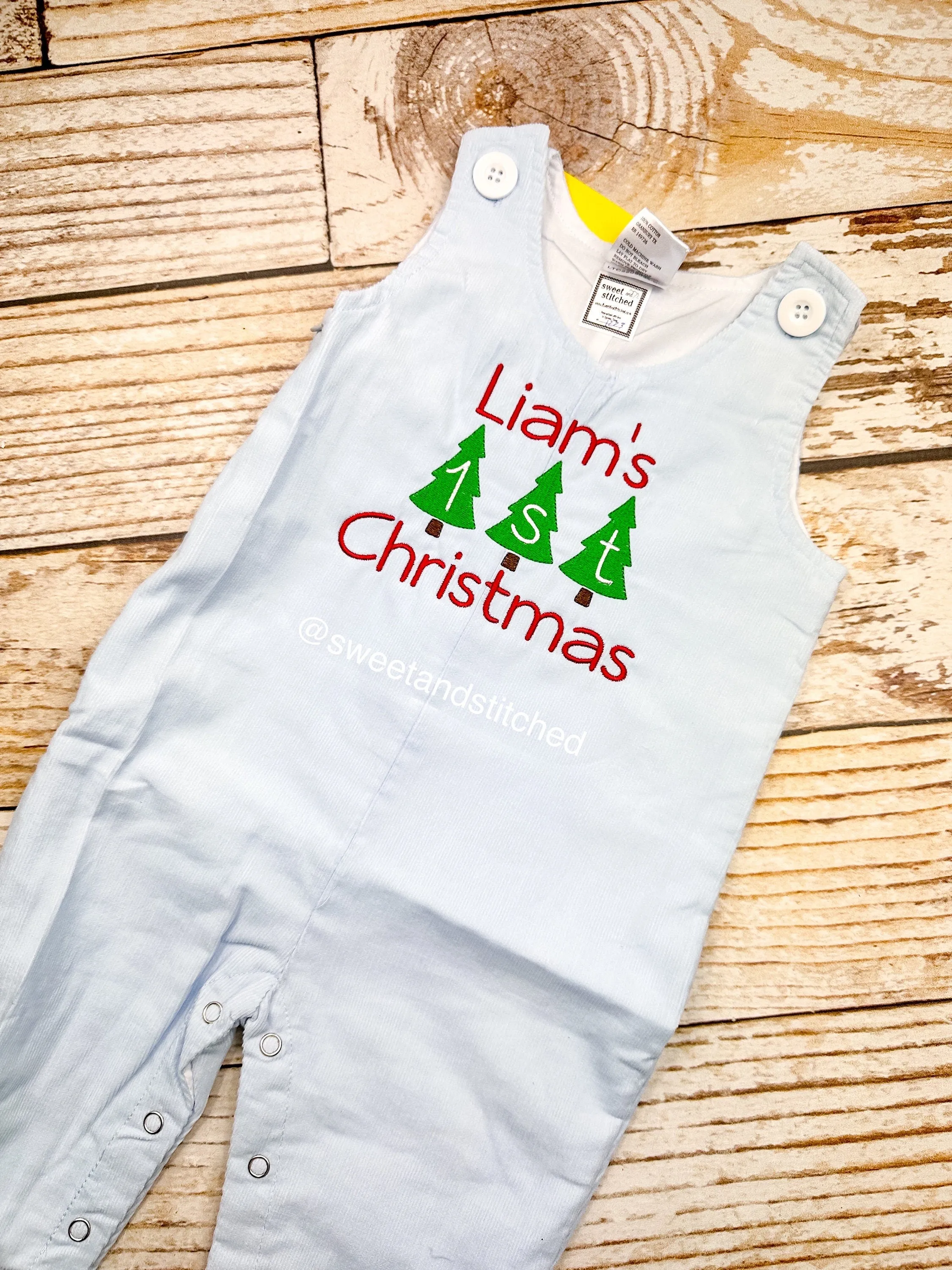 Personalized Baby Boy 1st Christmas outfit - monogrammed Christmas corduroy overalls in light blue.