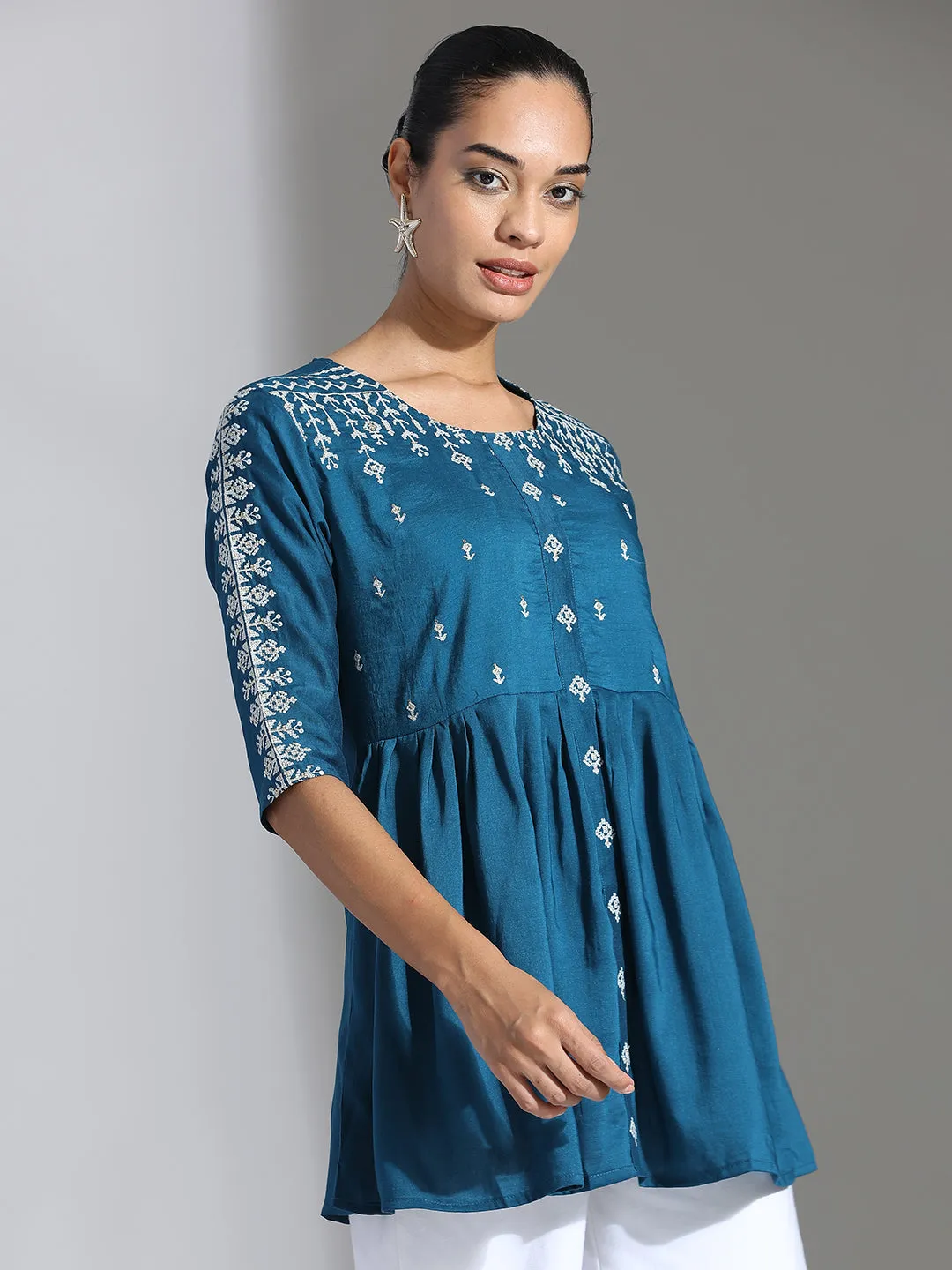 Teal Embroidered Party Wear Peplum Top