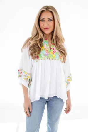 White top with embroidered detail