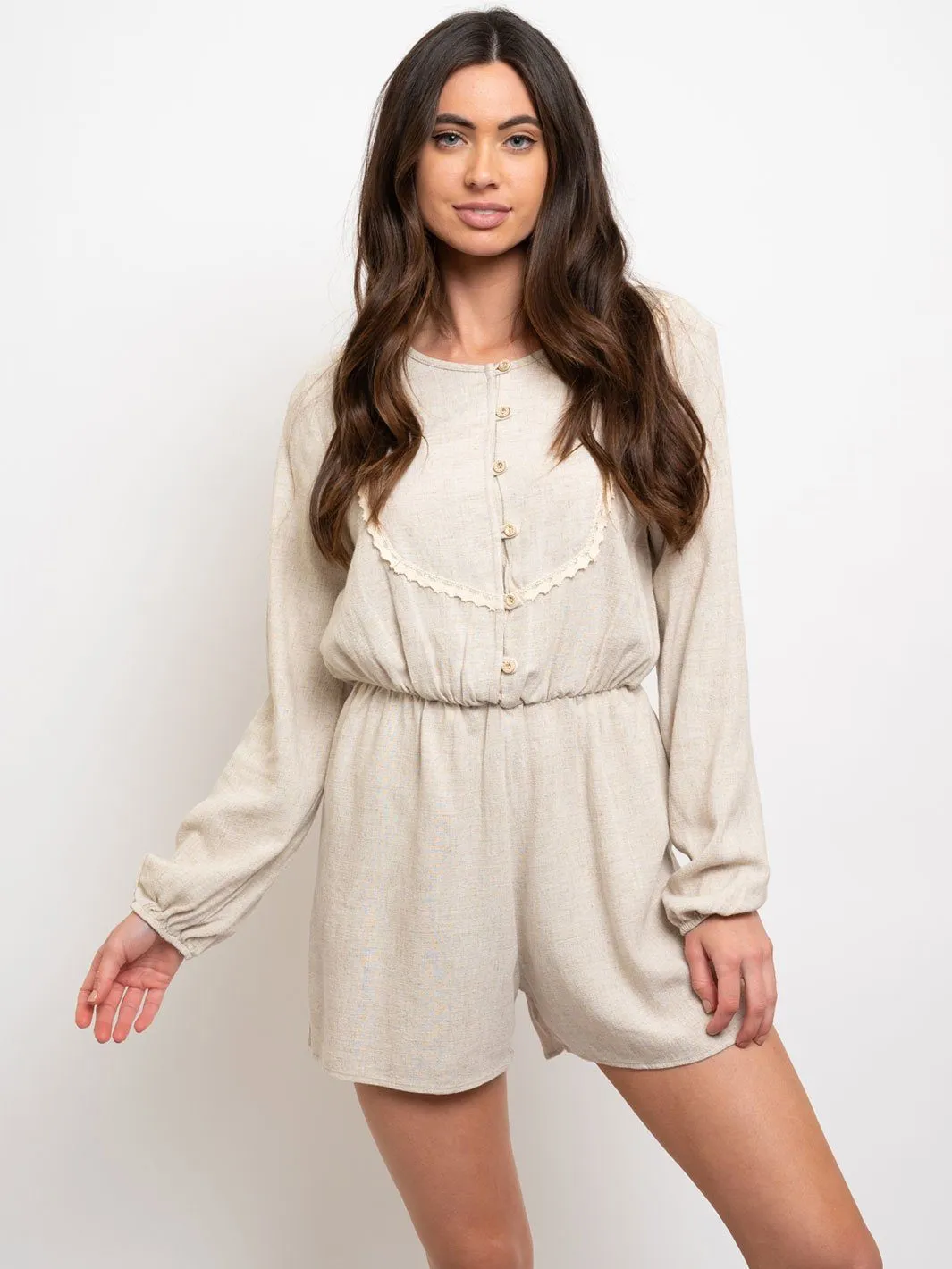 WOMEN'S LONG SLEEVE BUTTON DETAIL ROMPER