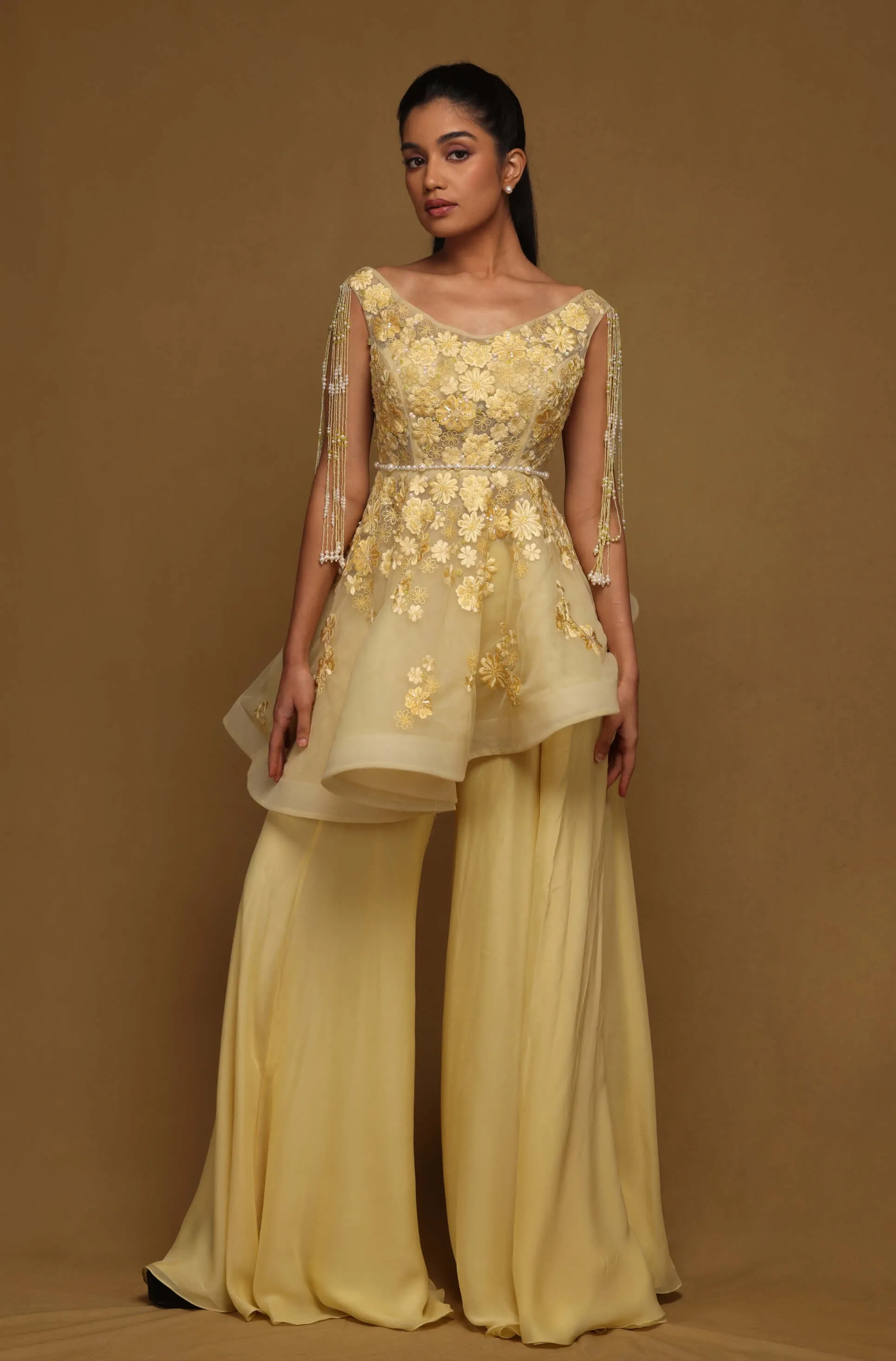 Yellow peplum and flared pant set