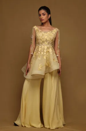 Yellow peplum and flared pant set