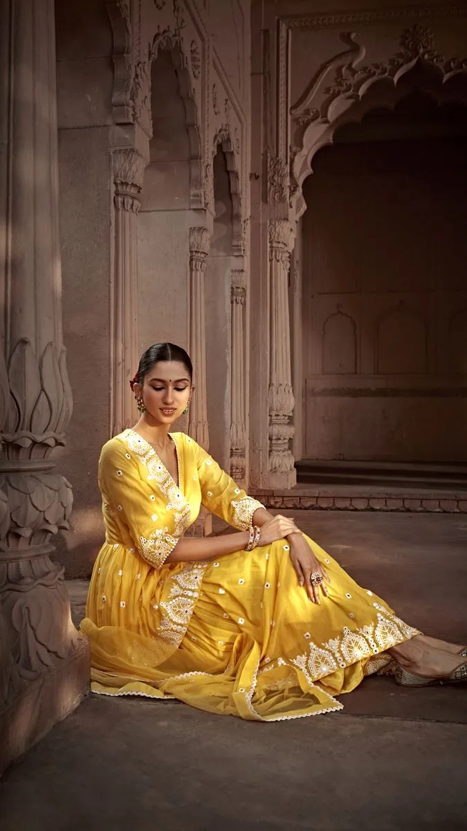 Yellow temple peplum sharara set